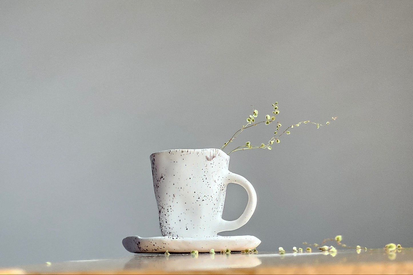 Black white ceramic cup with saucer