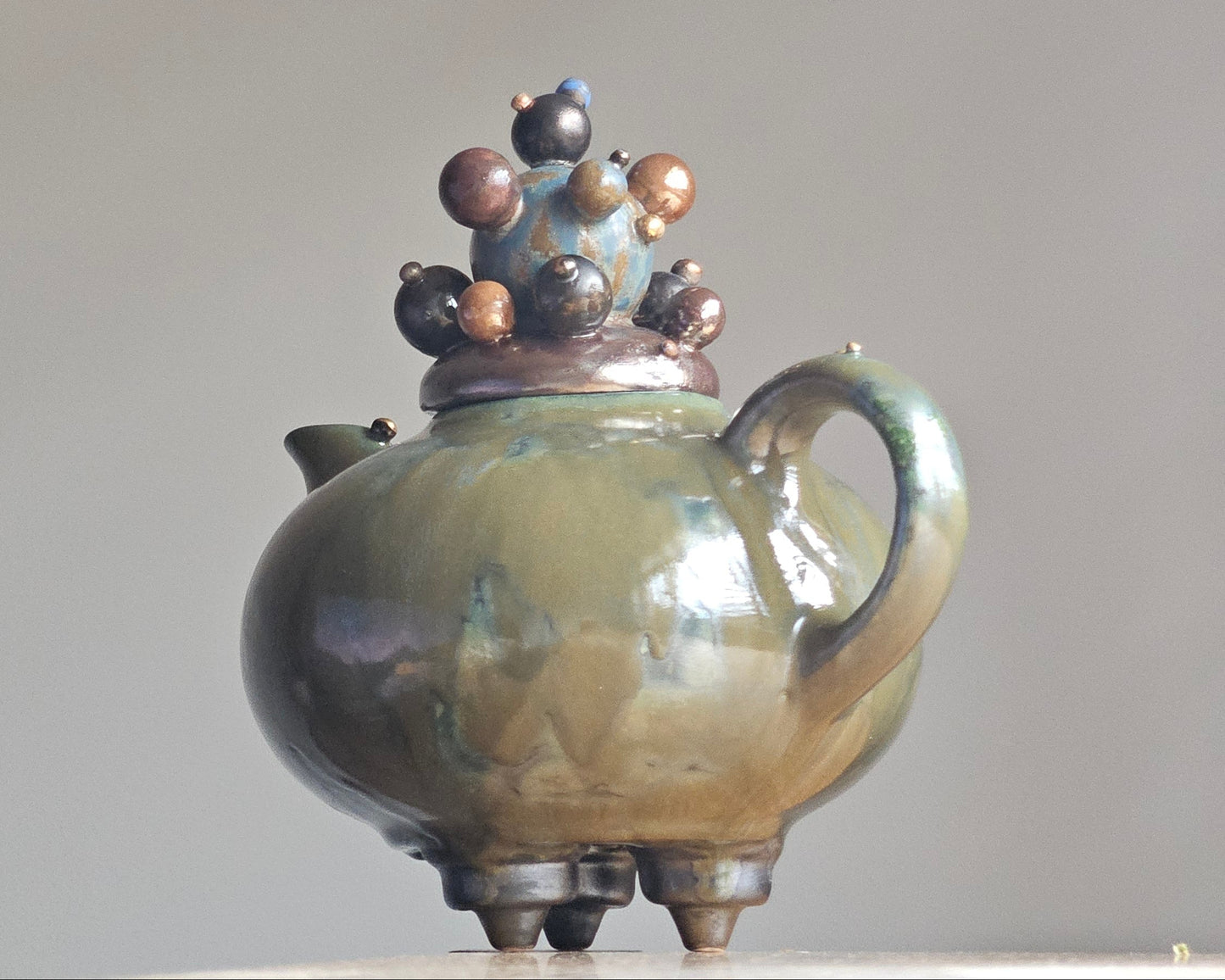 Green teapot-bubles