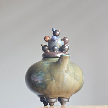 Green teapot-bubles