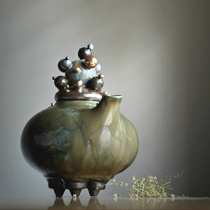 Green teapot-bubles