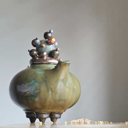 Green teapot-bubles