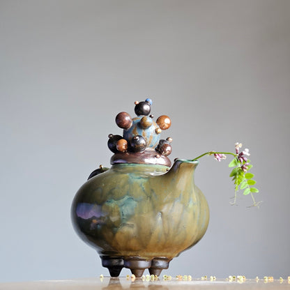 Green teapot-bubles