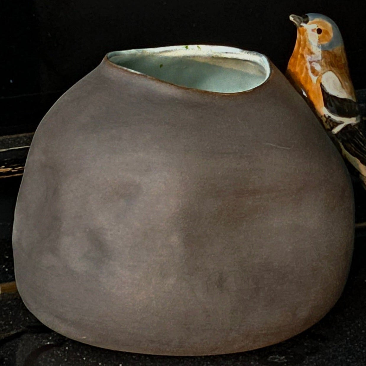 Vase with bird