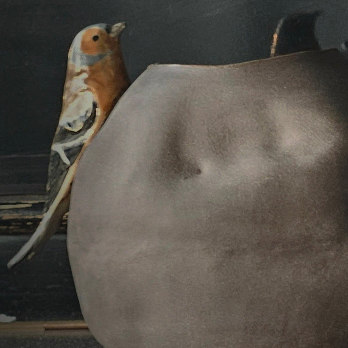 Vase with bird