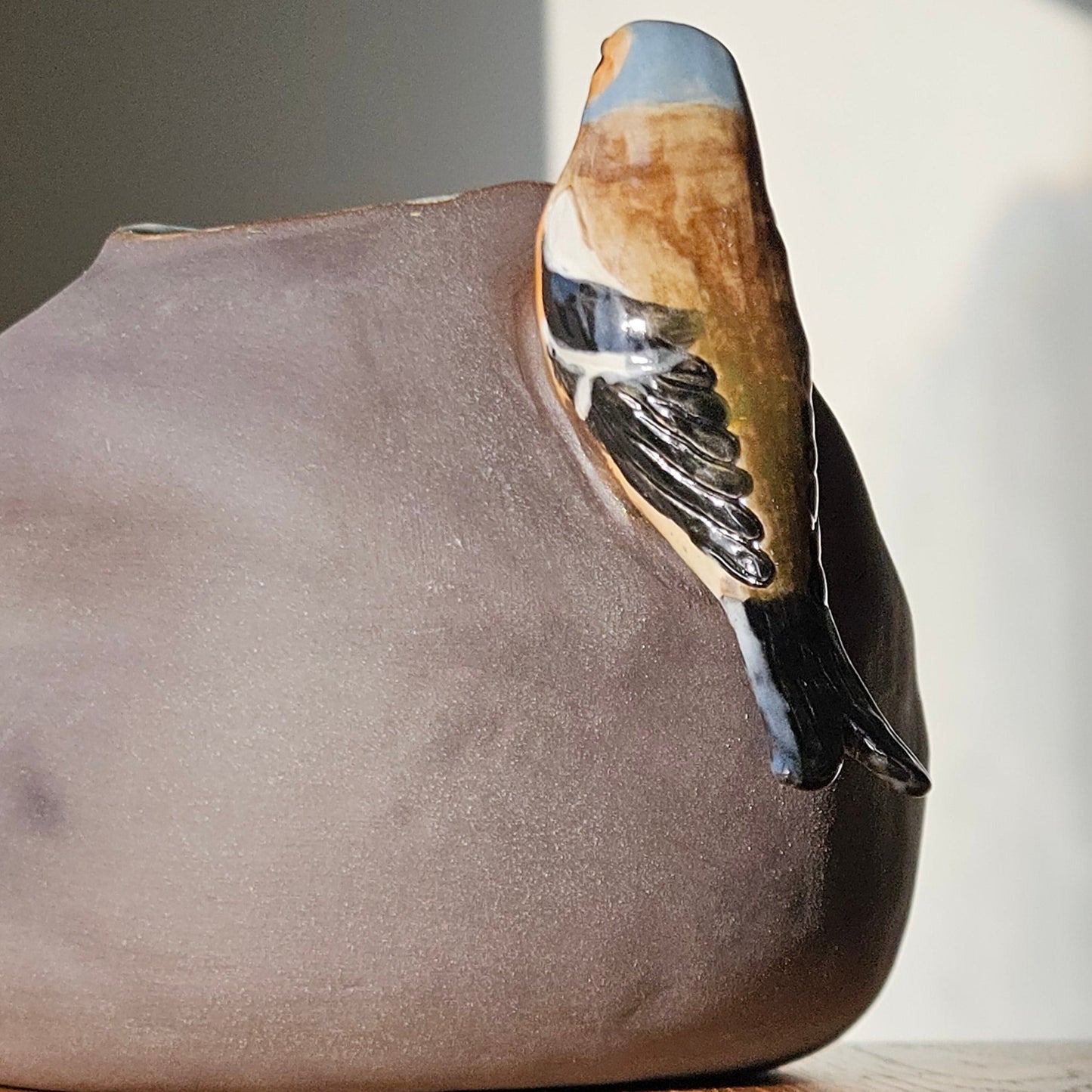 Vase with bird