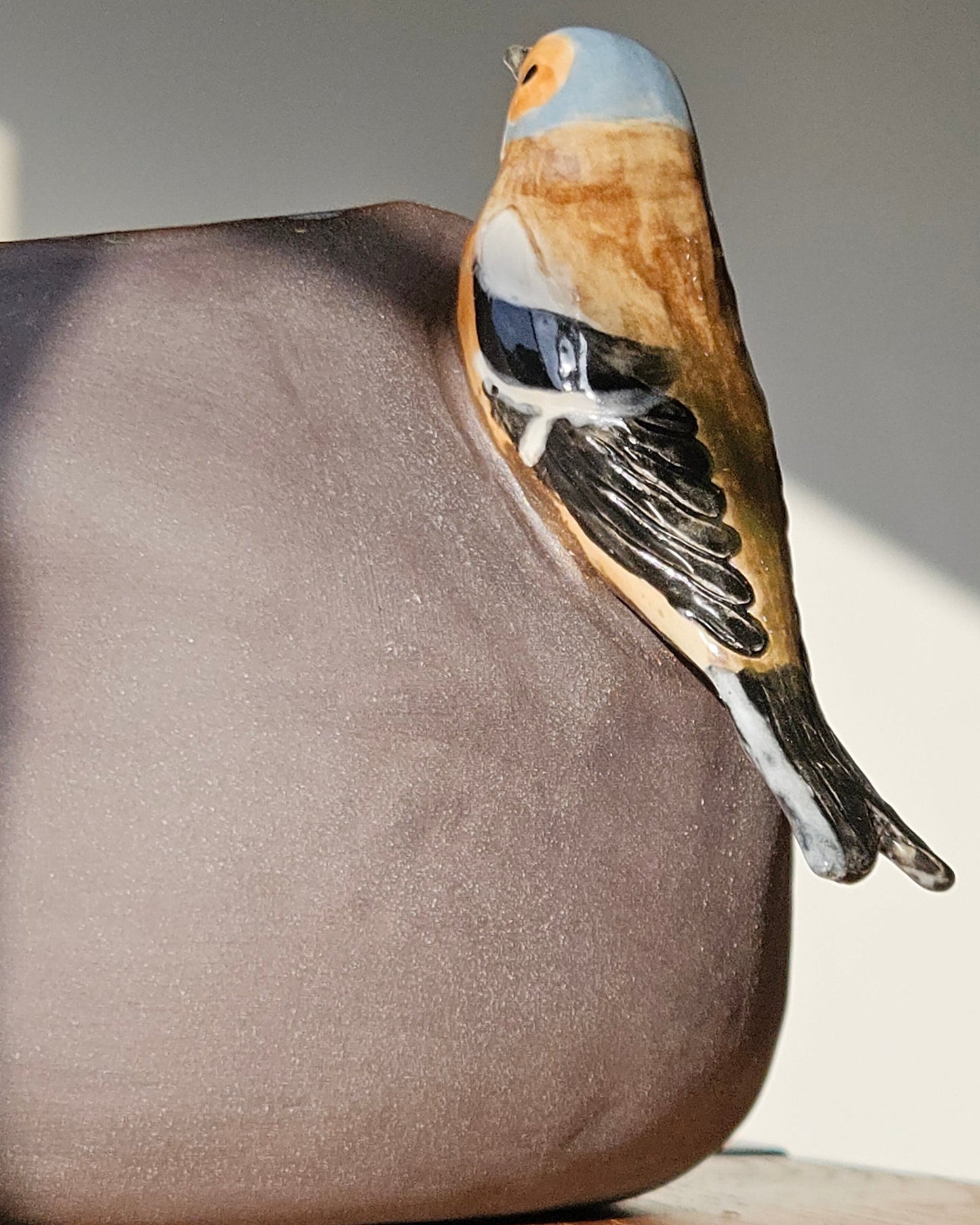 Vase with bird