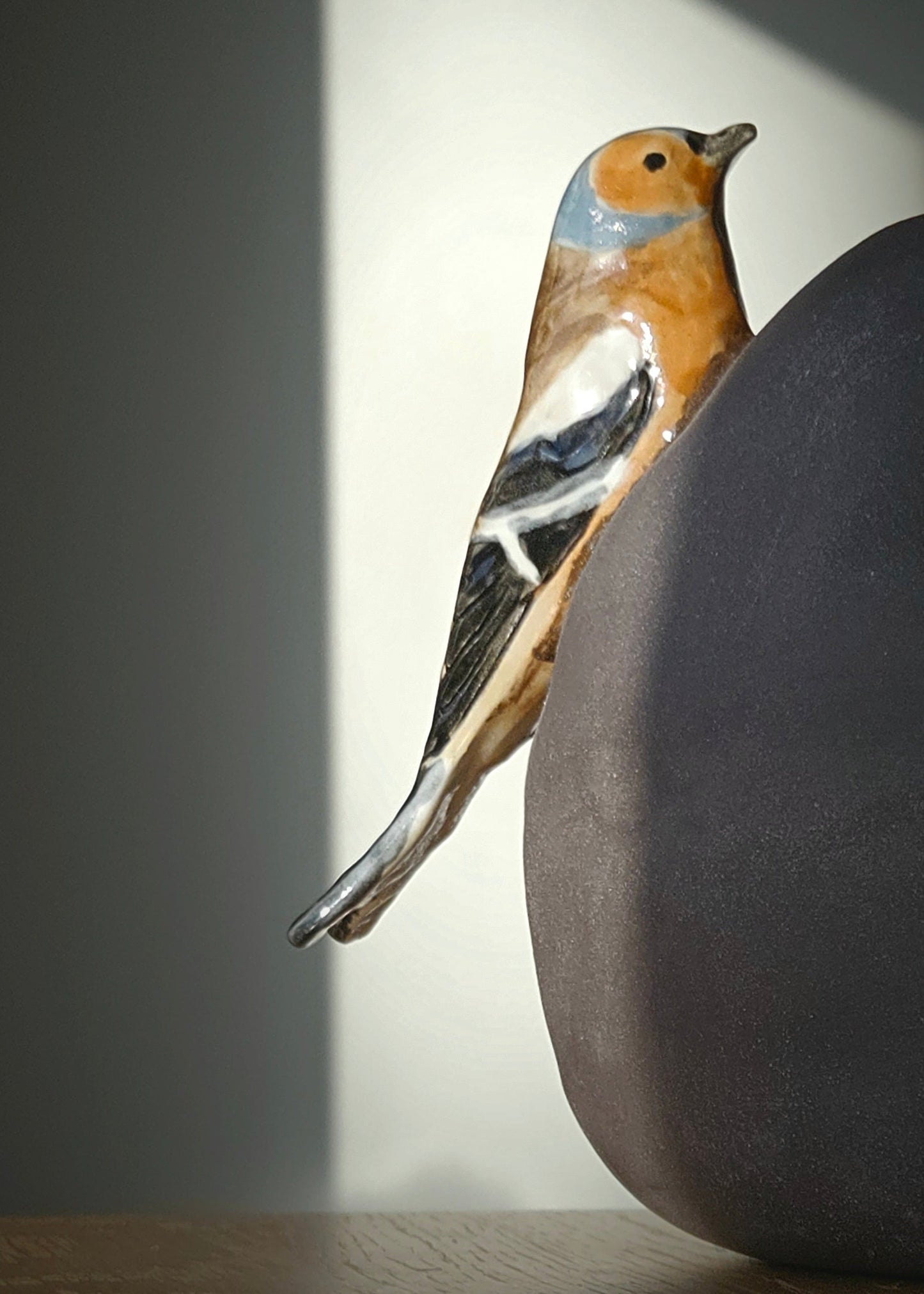 Vase with bird