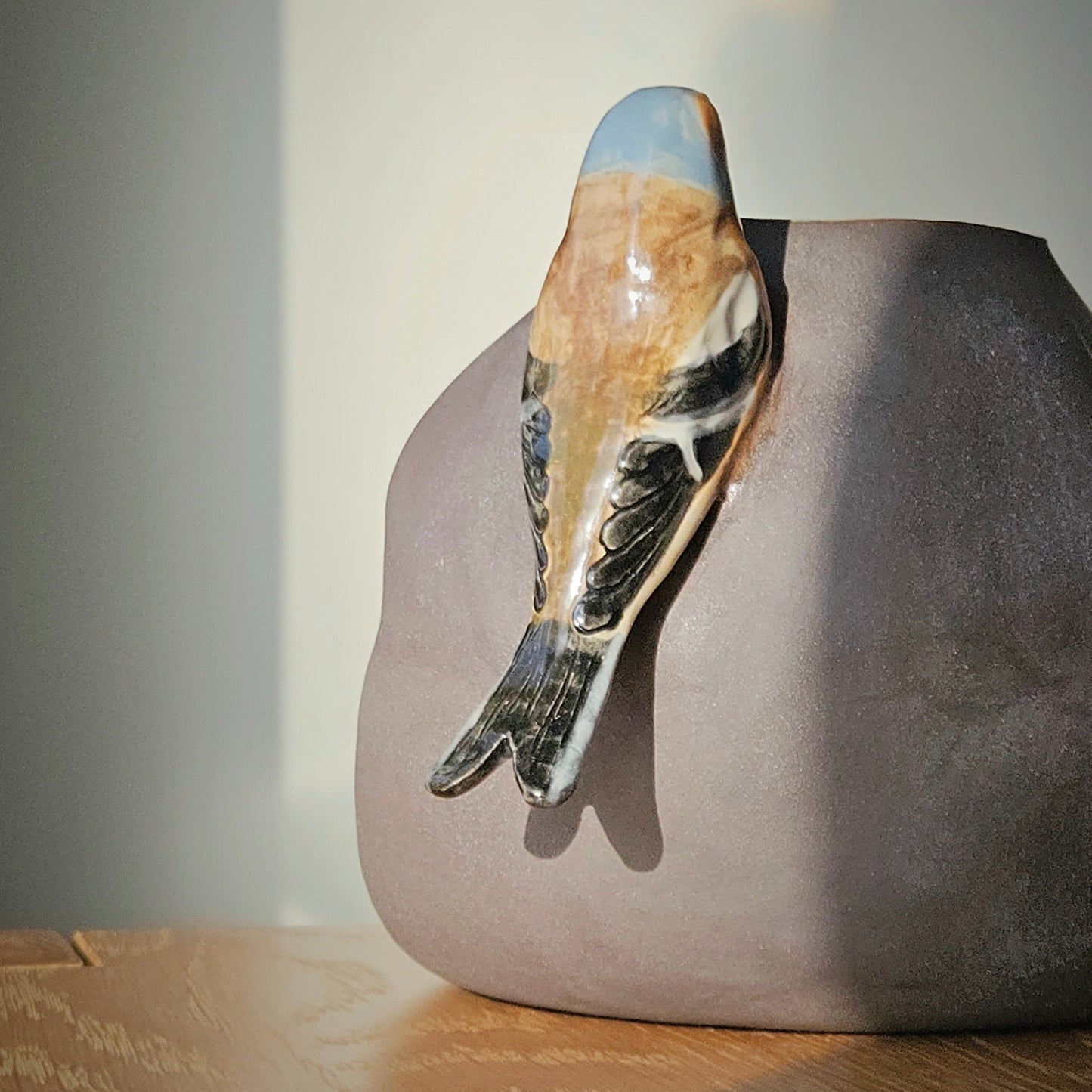 Vase with bird