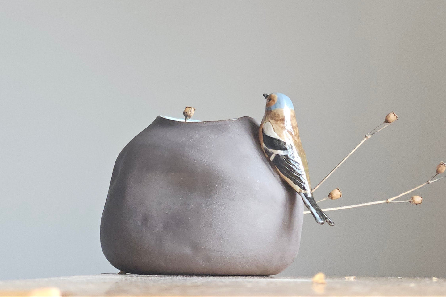 Vase with bird